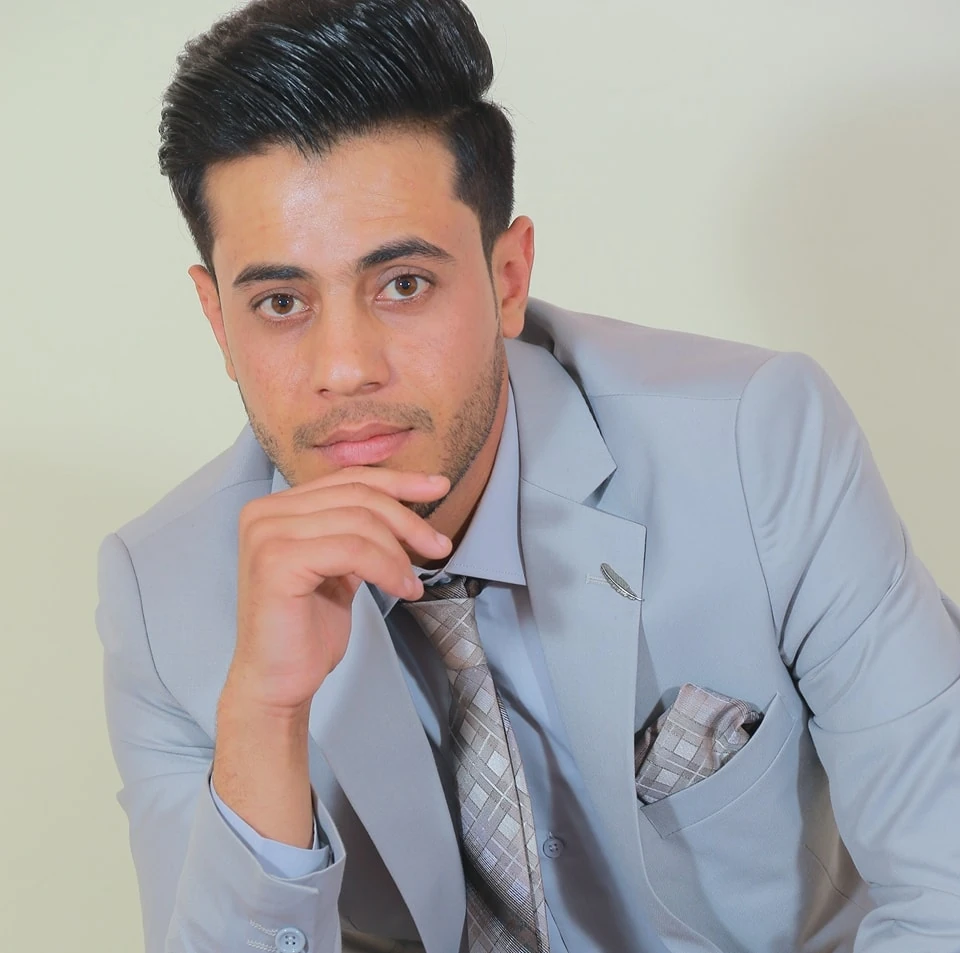 Noorullah Azizi in a formal suit